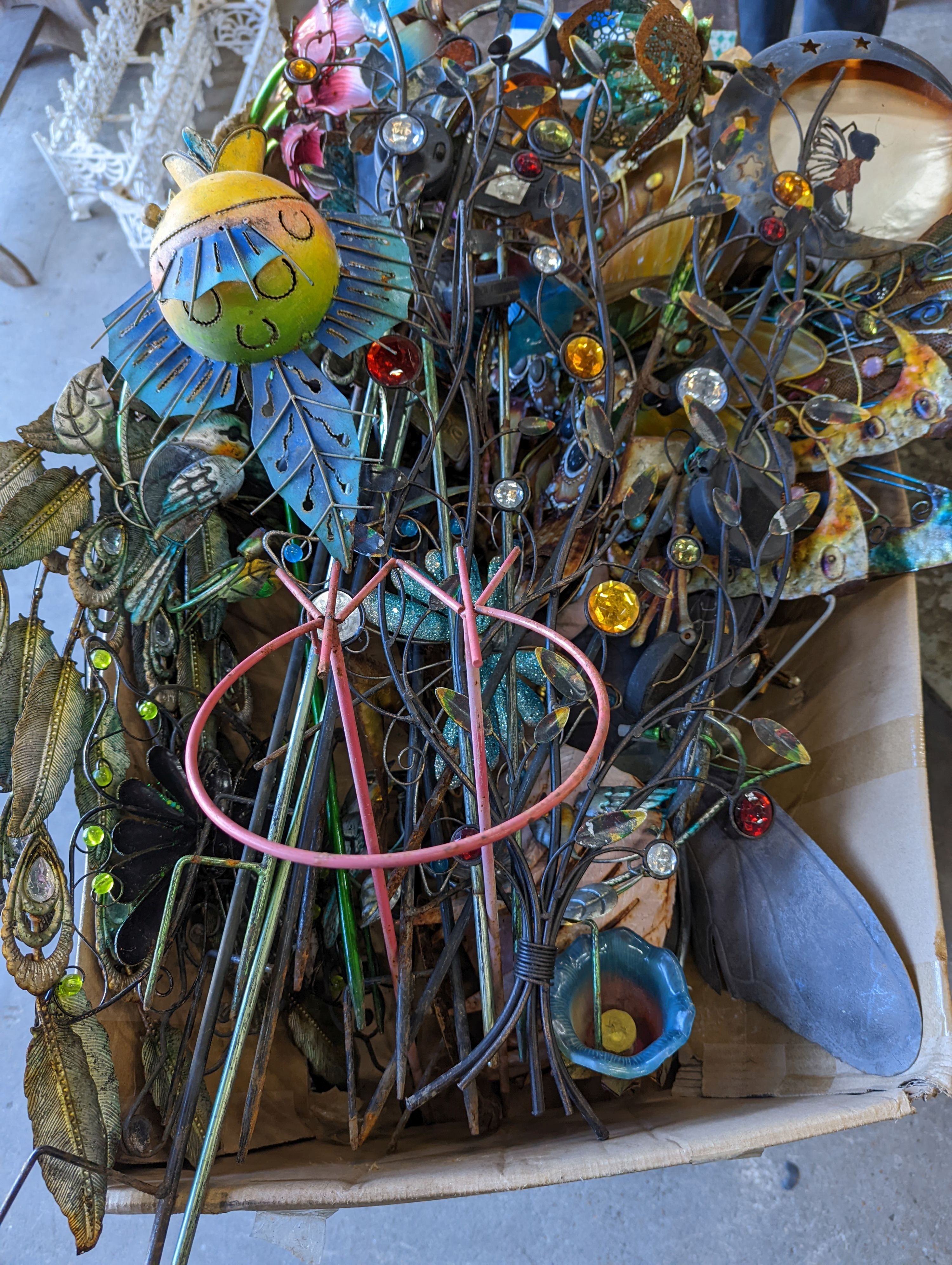 A quantity of assorted metal garden ornaments